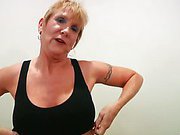 Athletic older woman exercises in skin tight shorts