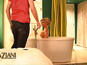 Some behind the scenes footage of naughty busty blonde, Angie Savage, frolicking around naked in the tub showing off her big boobs and gorgeous body!
